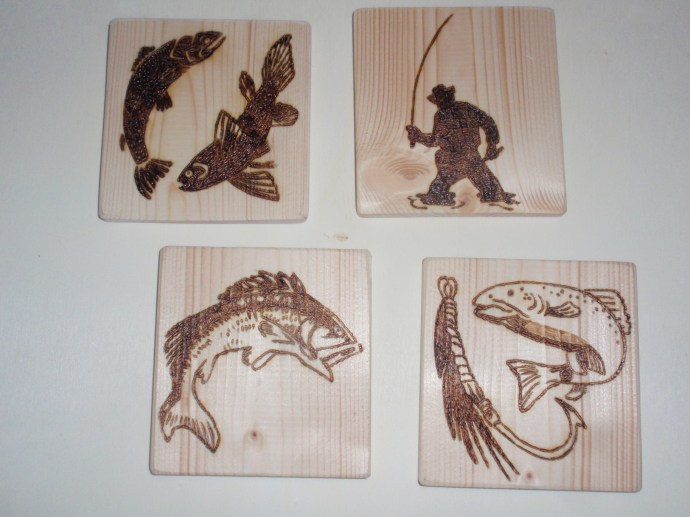 Bozze pirografate a soggetto pesca